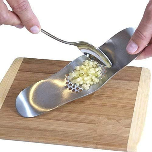 Fu Store Garlic Press 304 Stainless Steel Garlic Rocker Mincer Bonus Food Grade with Silicone Peeler Garlics (Color Random)...