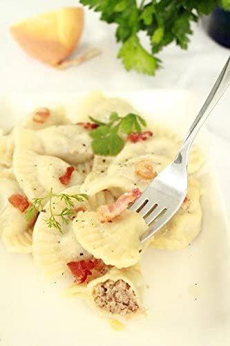 small pierogies, dumplings, uszka press/maker. Makes four small pierogies at once...