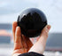 JIC Gem Small Black Obsidian Sphere Ball with Wooden Stand for Fengshui Healing Crystal Decoation Meditation Ball (2.2", 55mm)...