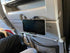 The SkyClip+ Phone & Tablet Holder for Air Travel, Home and Office Use - Inflight Phone Mount & Stand Compatible with iPhone, Android, Kindle and ...