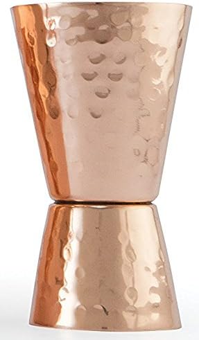 Copper jigger lacquered for the shine and to prevent tarnish. - Double 1oz/2oz copper measuring jigger for cocktail mixing. - Solid hammered coppe...