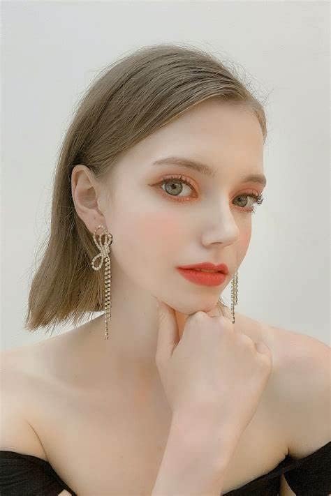 925 silver Crystal Bow Stud Earrings Fashion Ladies Tassel Rhinestone Earrings Hypoallergenic for Sensitive Ears...