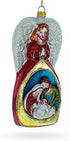 Angel Above Nativity Scene Blown Glass Christmas Ornament...