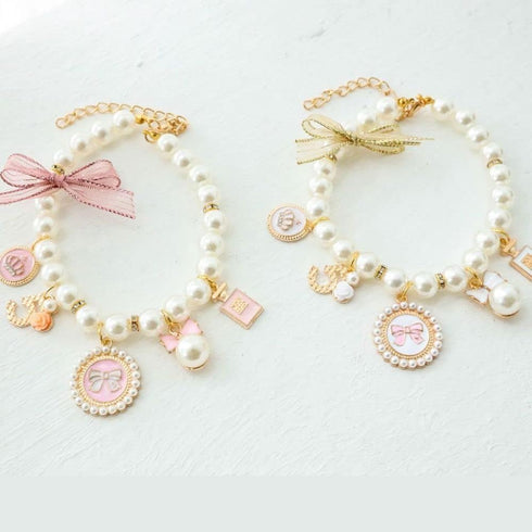 Dog Pearl Collars Princess Bow Necklace Pet Pearl Necklace DogCute Collar Puppy Accessories Cat Jewelry Pearl Neck Strap for Dog Cat (M)...