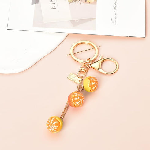 Simulated Food Fruit Orange Keychain Accessories for Women Teen Girls Cute 3D Cartoon Novelty Keychains for Adults Female Gold Resin Purse Car Bac...