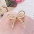 Bow Knot Brooch Rhinestones Pearl Bow Lapel Pin Alloy Pearl Brooch Satin Ribbon Bow Badge Women's Dress Shawl Sweater Decoration...