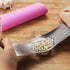 Fu Store Garlic Press 304 Stainless Steel Garlic Rocker Mincer Bonus Food Grade with Silicone Peeler Garlics (Color Random)...