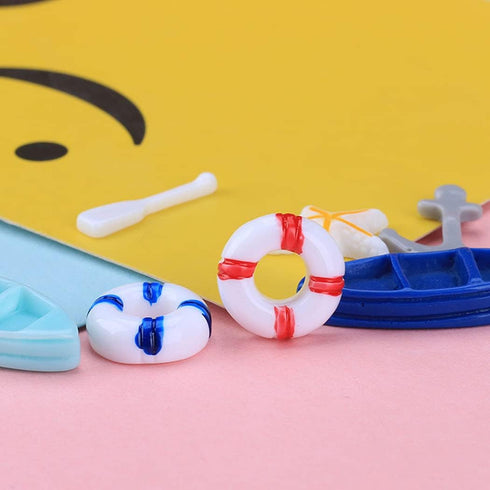Daimay 28PCS Resin Nautical Ornaments Miniature Beach Ornament Kits Mini Seaside Oars Canoe Anchor Lifebuoy Model Micro Landscape Scenery Decor Aq...