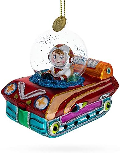 Astronaut in Space Vehicle Blown Glass Christmas Ornament...