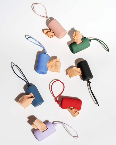 Wild One Dog Poop Bag Holder and Dispenser with Leash Attachment, Leak Proof, Easy Twist Top for Refills, Includes 1 Box Poop Bags, Blush...