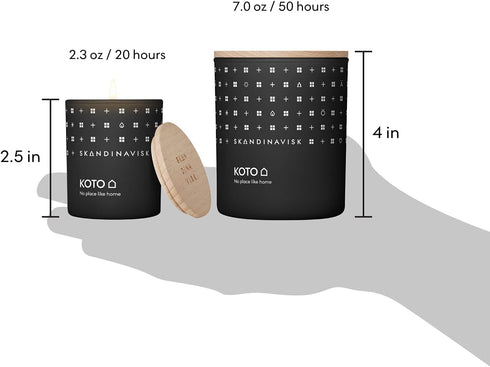 Skandinavisk KOTO 'Home' Mini Scented Candle. Fragrance Notes: Vanilla Beans and Dried Orange Peel, Amber and Leather. 2.3 oz....