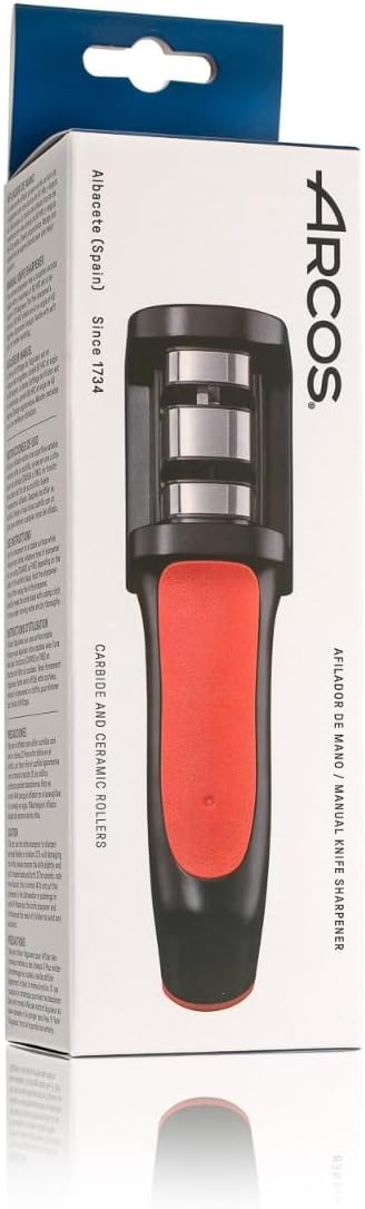 Arcos Sharpeners Manual Knife Sharpener tool. Made of ABS + TPE. Carbide and Ceramic Rollers. Keep Your Knives Razor Sharp. Black and Red Color...