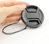 77mm Camera Lens Cap, PCTC Camera Lens CoverSnap-On Center Pinch Front Lens Cover with Strap Compatible with Nikon, Canon, Sony & Other DSLR Camer...