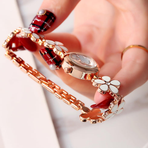 Women's bracelet watch fashion item waterproof quartz flower shaped watch...