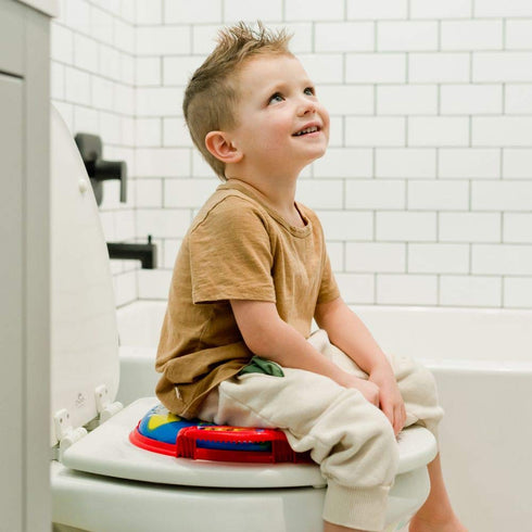 The First Years Disney Mickey Mouse Soft Potty Seat - Cushioned Toddler Toilet Seat Attachment - Toddler Potty Training Toilet Seat with Handles -...