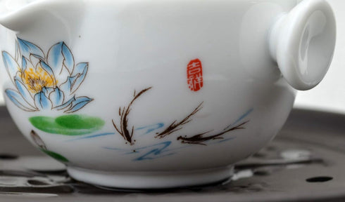 Liang baobao Convenient Teapot Cup Porcelain Teacup White Glazed Travel tea set (Lotus)...