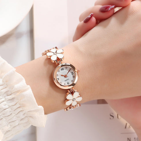 Women's bracelet watch fashion item waterproof quartz flower shaped watch...