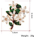Womens Flower Green Leaf Rhinestone Brooch Pin...