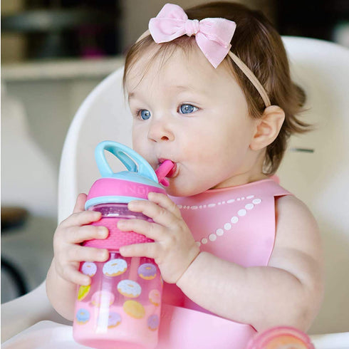 Nuby Thirsty Kids Flip-it Freestyle On the Go Water Bottle with Bite Resistant Hard Straw Cup and Easy Grip Band, Pink Donuts, 12 Ounce...