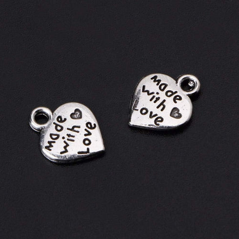 100pcs Heart Shape Charms Pendants Made with Love Letters Carving DIY Craft Necklace Bracelets Keychain Jewelry Making Findings Accessories (Ancie...