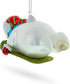 Snowman Gleefully Riding a Sled Glass Christmas Ornament...