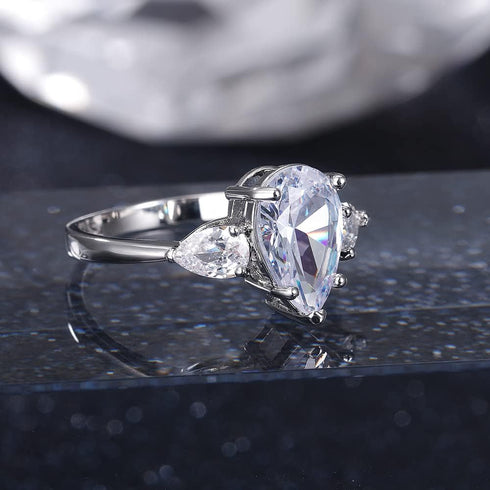 Hsitgexf Shining Classic Plated Silver Pear Cut Teardrop Halo Cubic Zirconia CZ Statement 3-Stone Eternity Wedding Engagement Ring for Women (US s...