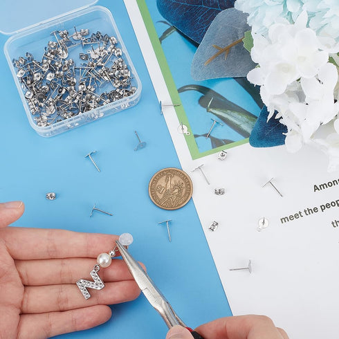 UNICRAFTALE 100pcs Flat Round Earring Post Kit 304 Stainless Steel Flat Round Post Ear Stud Findings with Loop and Ear Nuts for DIY Earring Making...