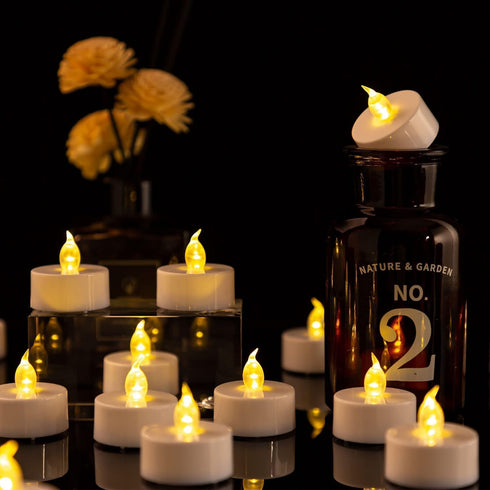 LED Tea Lights Candles- 24PACK Warm Yellow Flameless Candles Realistic and Bright Flickering Long Lasting 200Hours for Holiday Celebration,Party,H...
