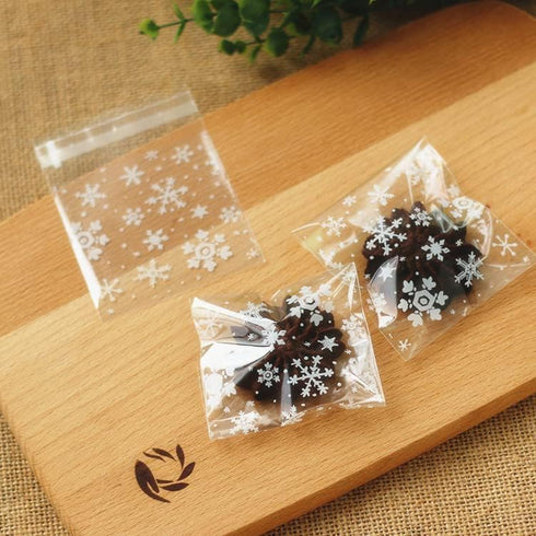 AKOAK 100 Count Resealable Clear Snowflake Bags Sweets Cookies Lollipops Cake Cellophane Bags Packaging Candy Cookie Plastic Bag Wedding Birthday ...