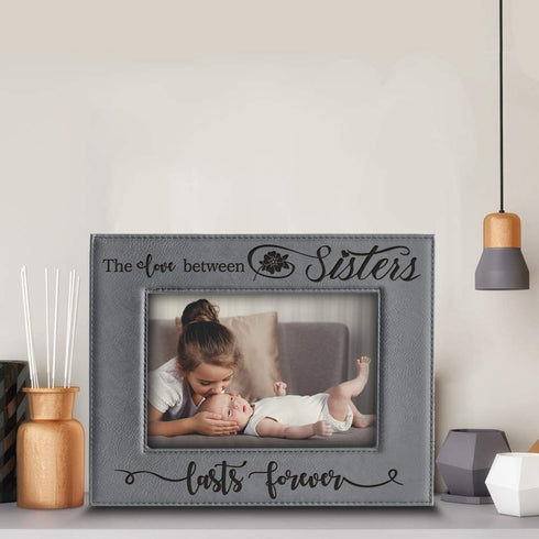 BELLA BUSTA The Love Between Sisters Lasts Forever_Birthday, Christmas gift for Sister-Engraved Leather Picture Frame (5 x 7 Horizontal)...