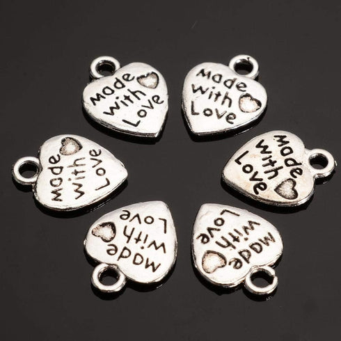 100pcs Heart Shape Charms Pendants Made with Love Letters Carving DIY Craft Necklace Bracelets Keychain Jewelry Making Findings Accessories (Ancie...