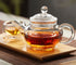 123Arts Small Tea Pot, Glass Teapot with Infuser, Tea Kettle for Loose Tea with Lid, 8 Oz...
