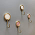 Solid Brass Decorative Wall Hook, Self-Adhesive Hole Free Wall Mount, Shining Gold Fancy Hook (Seashell White–Pack of 2)...