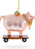 Playful Pig Riding a Skateboard Glass Christmas Ornament...