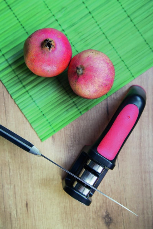 Arcos Sharpeners Manual Knife Sharpener tool. Made of ABS + TPE. Carbide and Ceramic Rollers. Keep Your Knives Razor Sharp. Black and Red Color...