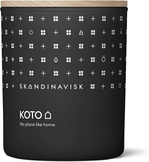 Skandinavisk KOTO 'Home' Mini Scented Candle. Fragrance Notes: Vanilla Beans and Dried Orange Peel, Amber and Leather. 2.3 oz....
