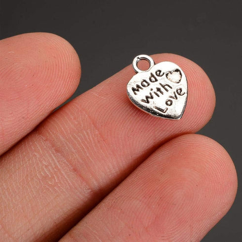 100pcs Heart Shape Charms Pendants Made with Love Letters Carving DIY Craft Necklace Bracelets Keychain Jewelry Making Findings Accessories (Ancie...