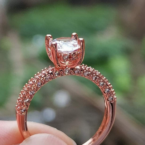 XIALV Rose Gold Plated Cubic Zirconia 2 Carats Oval Cut Ring Simulated Diamond CZ Wedding Engagement Ring for Women (US size 7)...