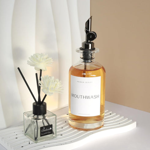 Mouthwash Dispenser for Bathroom, Clear Glass Mouth Wash Container with Stainless Steel Pour Spout, Refillable Mouthwash Bottle with Waterproof La...