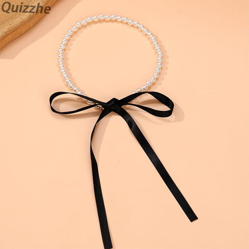 Boho Pearl Bow Choker Necklace Black Velvet Long Ribbon Bow Collarbone Chain Vintage Pearl Beaded Choker Necklace Birthday Party Jewelry for Women...