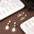 1 Box 120Pcs Hypoallergenic Pearl Earring Posts Pearl Earring Stud Findings with Loop and Imitation Pearl Beads Gold Stainless Steel Earring Studs...