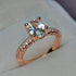 XIALV Rose Gold Plated Cubic Zirconia 2 Carats Oval Cut Ring Simulated Diamond CZ Wedding Engagement Ring for Women (US size 7)...