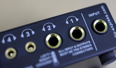 AXA40 Mini 4 Channel Combination 1/4" and 3.5mm TRS Stereo Headphone Amplifier w/Two 3.5mm and Two ¼” TRS Stereo Outputs Includes 12V Power Supply...