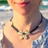 BlueRica Braided Black Cord Choker Necklace with Cowrie Shell Flower Pendant...