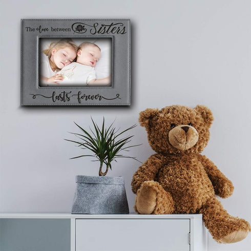 BELLA BUSTA The Love Between Sisters Lasts Forever_Birthday, Christmas gift for Sister-Engraved Leather Picture Frame (5 x 7 Horizontal)...