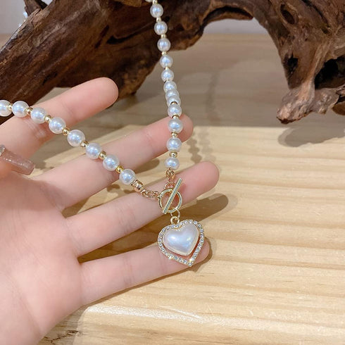 IMEGILO Pearl Necklaces for Women?6mm Faux Pearl Necklace?14K Gold Plated Heart Pearl Necklace,Fashion Accessories is Perfect for any Occasion It'...