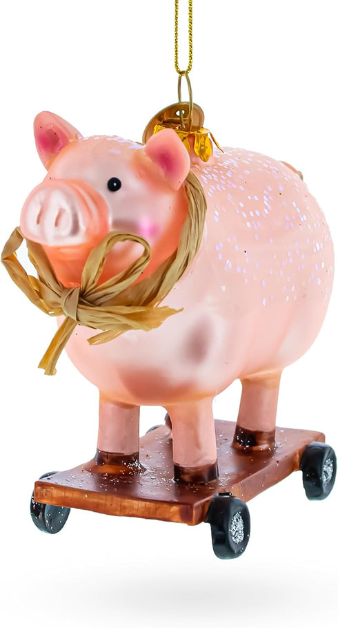 Playful Pig Riding a Skateboard Glass Christmas Ornament...
