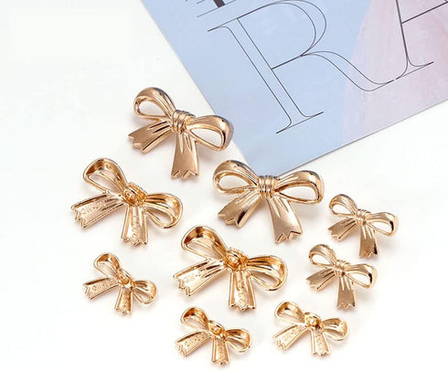 20 Pcs Alloy Bow Shaped Buttons for DIY Crafting Project and Sewing Clothing Coat Cloak Sweater Shirts, 2 Sizes...