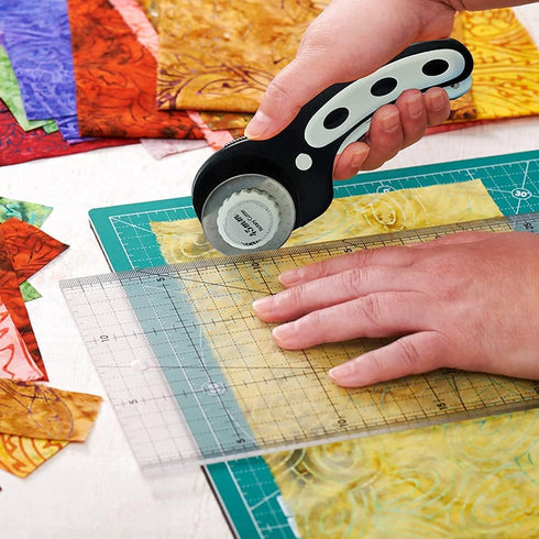 45mm Rotary Cutter with 7pcs Replacement Blades, Ergonomic Handle Rolling Cutter with Safety Lock for Fabric, Leather, paper, Crafting, sewing, Qu...