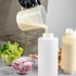 Restaurantware 32oz. FIFO Inverted Plastic Squeeze Bottle with Refill and Dispensing Lids - First In First Out - Perfect for Restaurants Catering ...